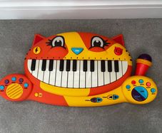 B. toys Meowsic Interactive Cat Piano with Microphone