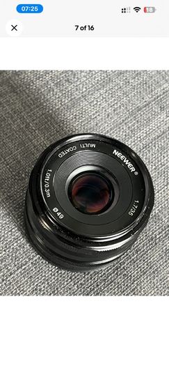 Sony a6000 + 16-50 kit lens + Neewer 1.7/35 lens + Accessories