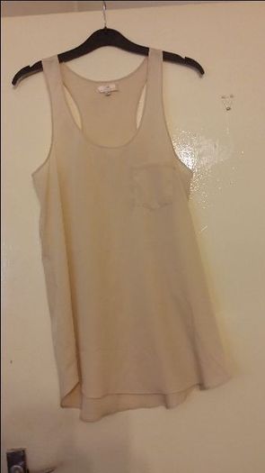 Brand new River Island  top size 8 EUR36 price includes post