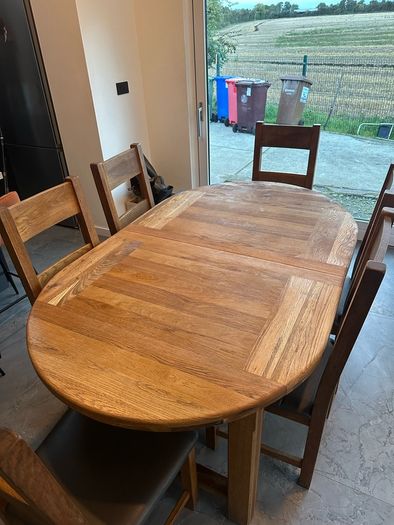 solid oak table and 6 chairs