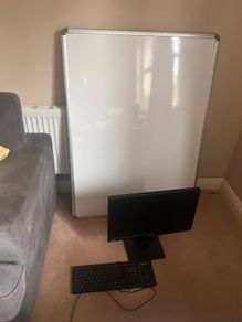 Wall mounted whiteboard. Excellent condition.