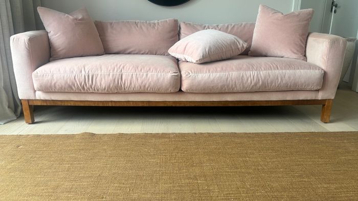 Pink velvet sofa