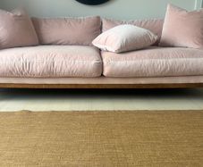 Pink velvet sofa