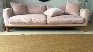 Pink velvet sofa
