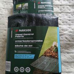 Two packets of unopened Weed Control Fabric from Lidl