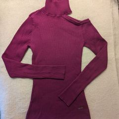 DKNY deep fuchsia turtleneck with free left shoulder detail