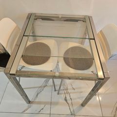 Glass Ikea table with chairs