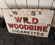 Wills Wild Woodbine enamel sign