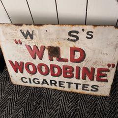 Wills Wild Woodbine enamel sign