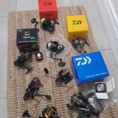 few new fishing reels for sale