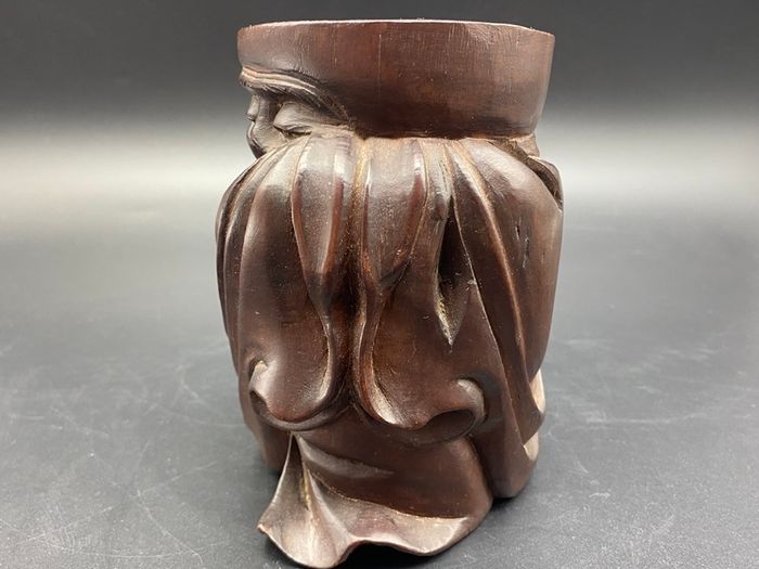Chinese carved hardwood brush pot, carved with a Chinese Man