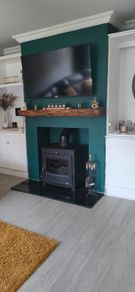18kw stove, hearth and custom made mantlepiece