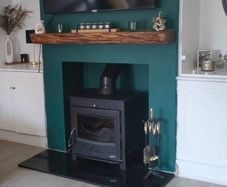 18kw stove, hearth and custom made mantlepiece