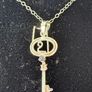 silver key on chain with genuine sapphire Image 2