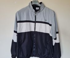 Lacoste full zip track top Size xl ptp 24" black/grey In excellent condition