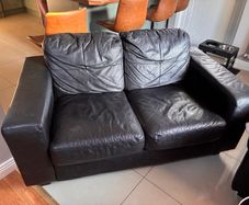 2 seater black leather sofa