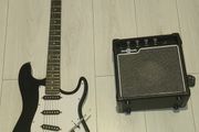Electric guitar with amp and gigbag