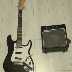 Electric guitar with amp and gigbag