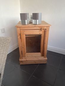 Glass fronted solid waxed pine unit