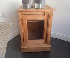 Glass fronted solid waxed pine unit