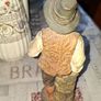 Old Painted Terracotta of a Young Country Boy Holding a Flute, standing on a rocky base. It resembles late 19th- or early 20th-century European decorative sculptures, such as pieces produced by makers like Goldscheider Image 5