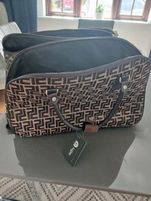 Brown carrier bag on wheels