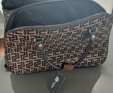 Brown carrier bag on wheels
