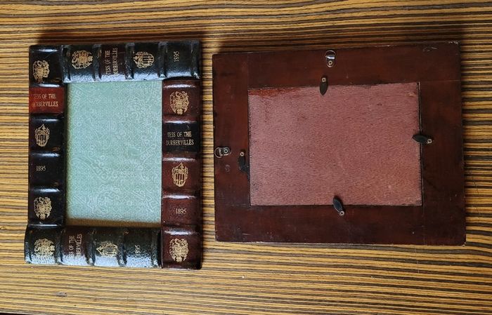 Vintage pair of leather book style photo frames