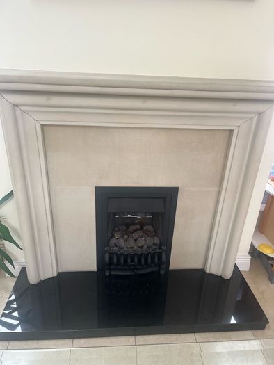 stone fireplace with gas fire