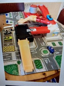 Carry case Opens Into a Big City Garage & Road way.