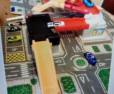 Carry case Opens Into a Big City Garage & Road way.