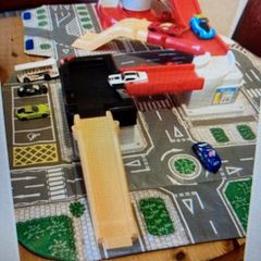 Carry case Opens Into a Big City Garage & Road way.
