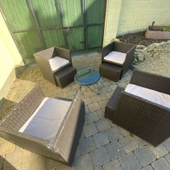 Rattan Garden Chairs with footstool & table.