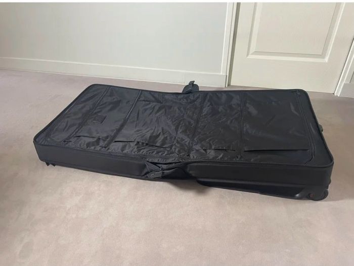Tumi large garment wheeled suitcase
