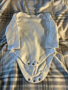 new vest 9/12 mths