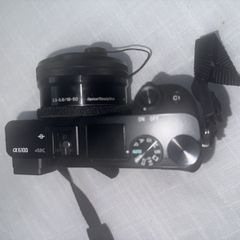 Sony Alpha A6100 digital mirrorless camera with two lenses