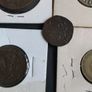 Seven Assorted Coins Image 7