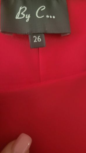 Plus size wedding  guest  dress in coral .