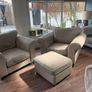 Two extra wide beige armchairs and pouffe Image 2