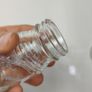 335 - Set of 2 Vintage Clear Glass Collectible Decorative Jars Image 3
