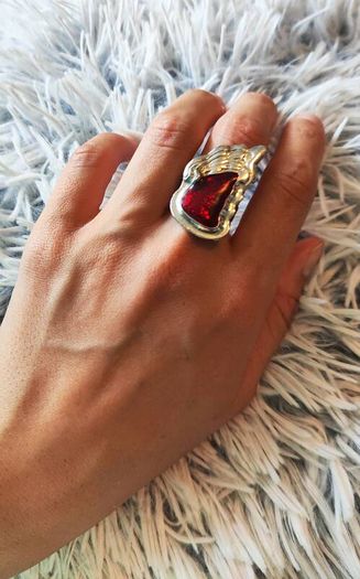 Unique design ring with a red angel wing stone