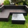 Rattan L shape garden lounge set with table Image 6
