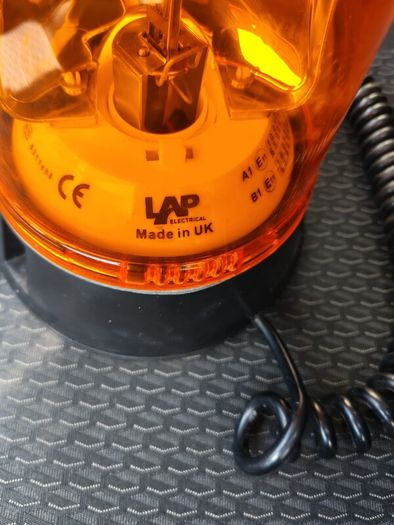 Lap rotating orange beacon