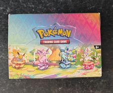 FREE Tracked Shipping. Pokemon Prismatic Evolutions Mini Tin Display