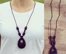 Black teething necklace for babies and parents.