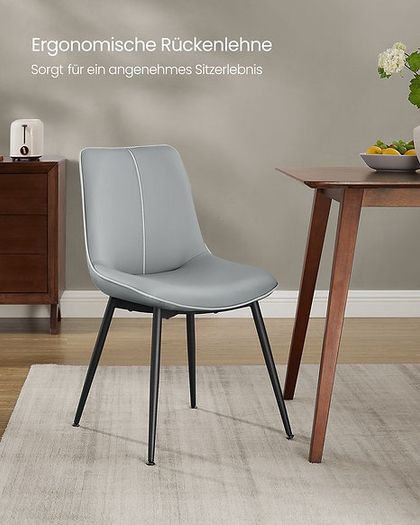 2 x faux leather dining chairs