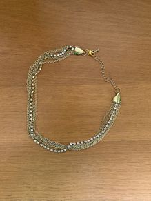 Multi chain gold tone necklace