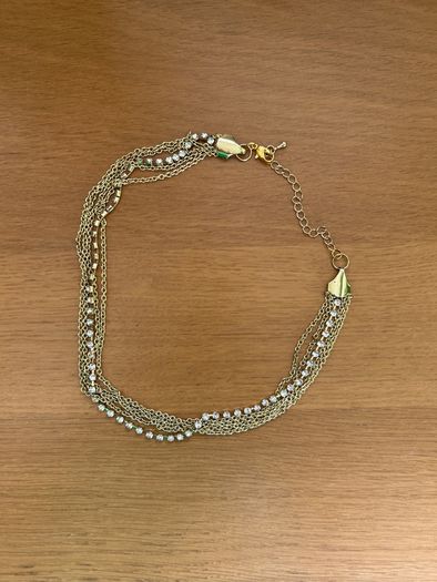 Multi chain gold tone necklace
