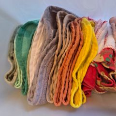 Selection of various bibs for babies