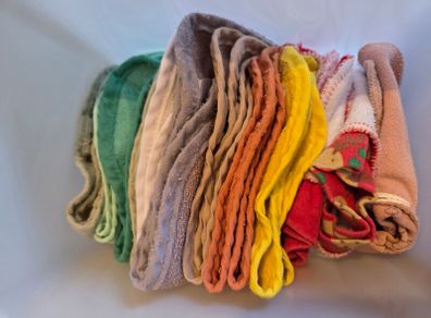 Selection of various bibs for babies